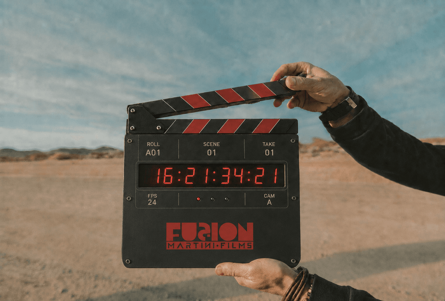 Clapperboard held up roadside during a shoot